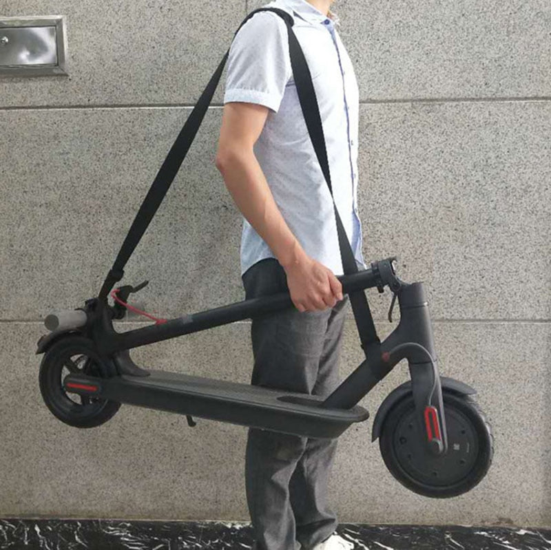 Correa de transporte para scooter y skateboard, diseñada para facilitar el traslado