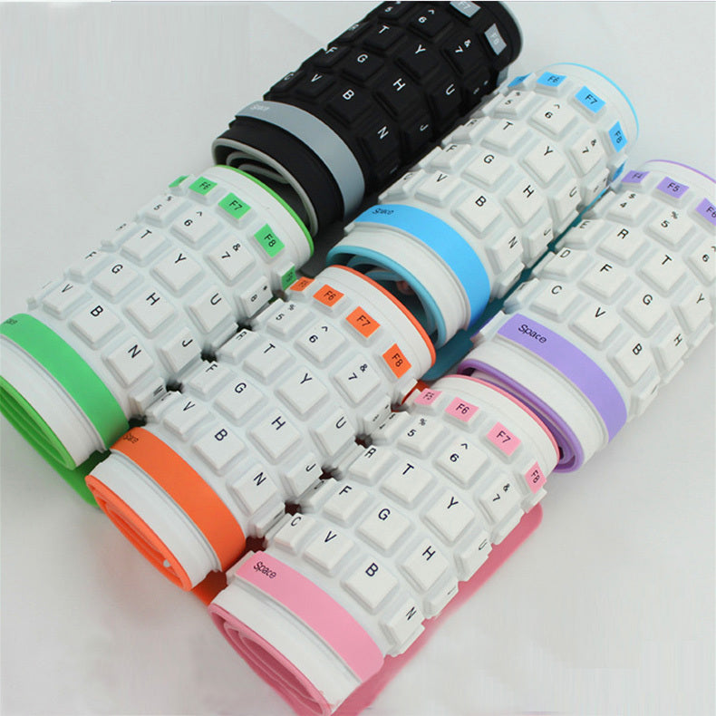 Teclado Curvo Plegable de Silicona  Silencioso & Resistente al Agua