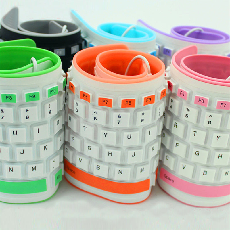 Teclado Curvo Plegable de Silicona  Silencioso & Resistente al Agua