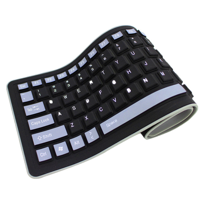 Teclado Curvo Plegable de Silicona  Silencioso & Resistente al Agua